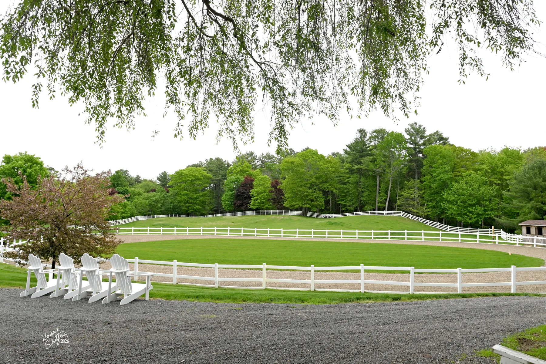 The outdoor show arena and hillside paddocks in York, Maine